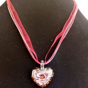 Heart shaped pendant necklace.